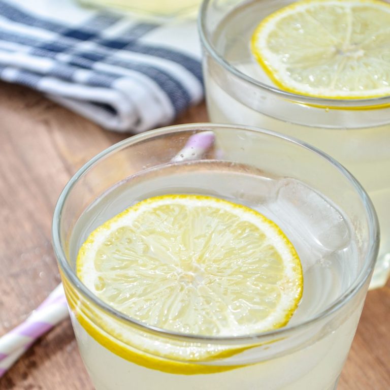 Instant pot lemonade, served in glasses with a lemon slice.