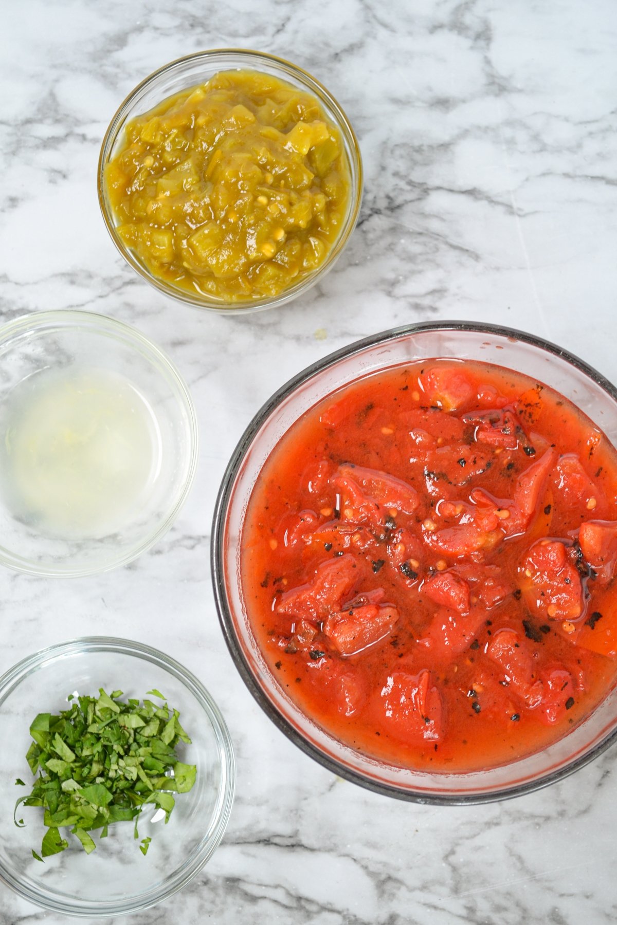 The ingredients needed to make homemade tomatoes and green chilies AKA Copycat Rotel!