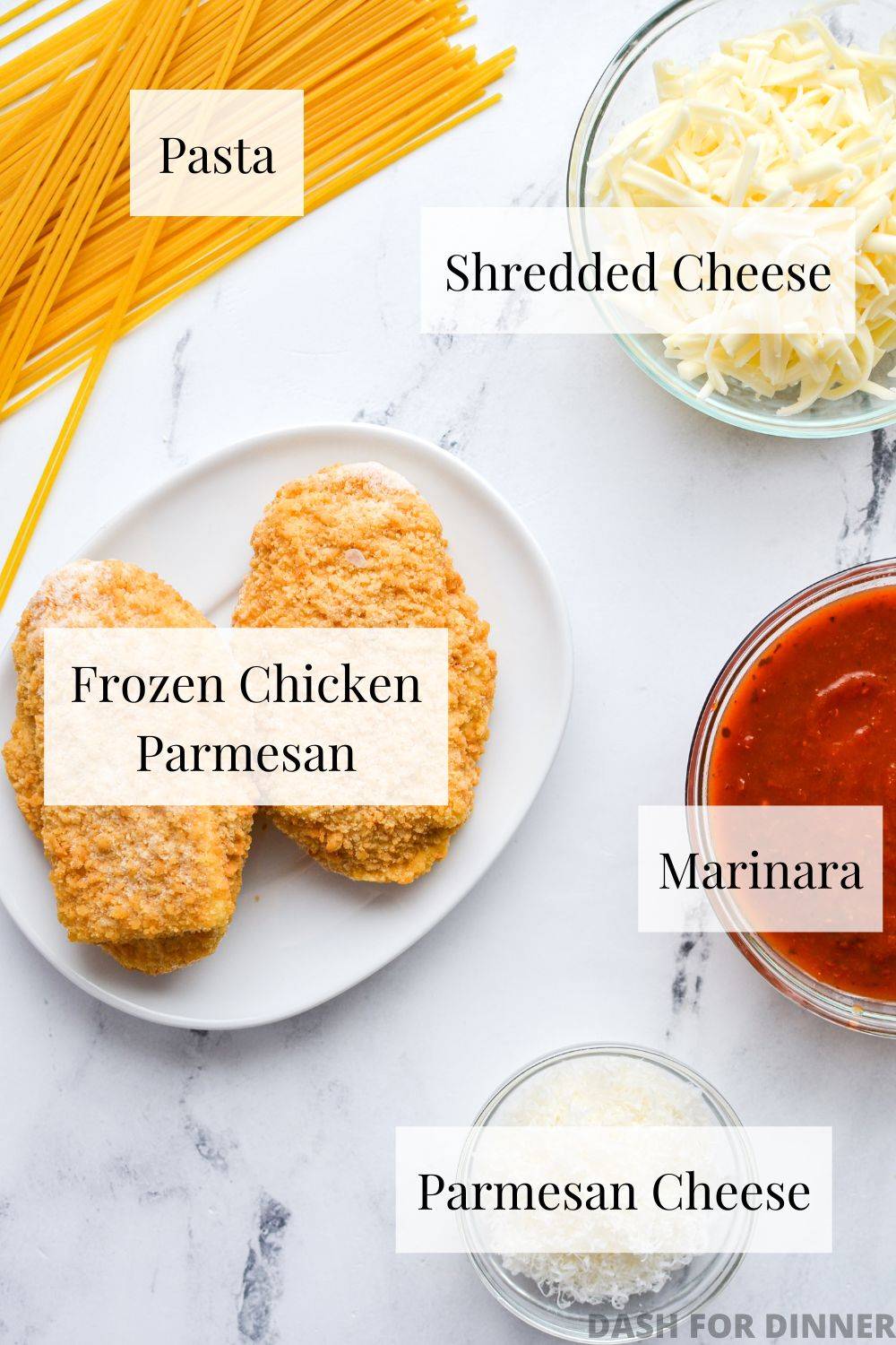The ingredients needed to make frozen chicken parmesan - frozen chicken parmesan, pasta, shredded cheese, marinara, and parmesan cheese.