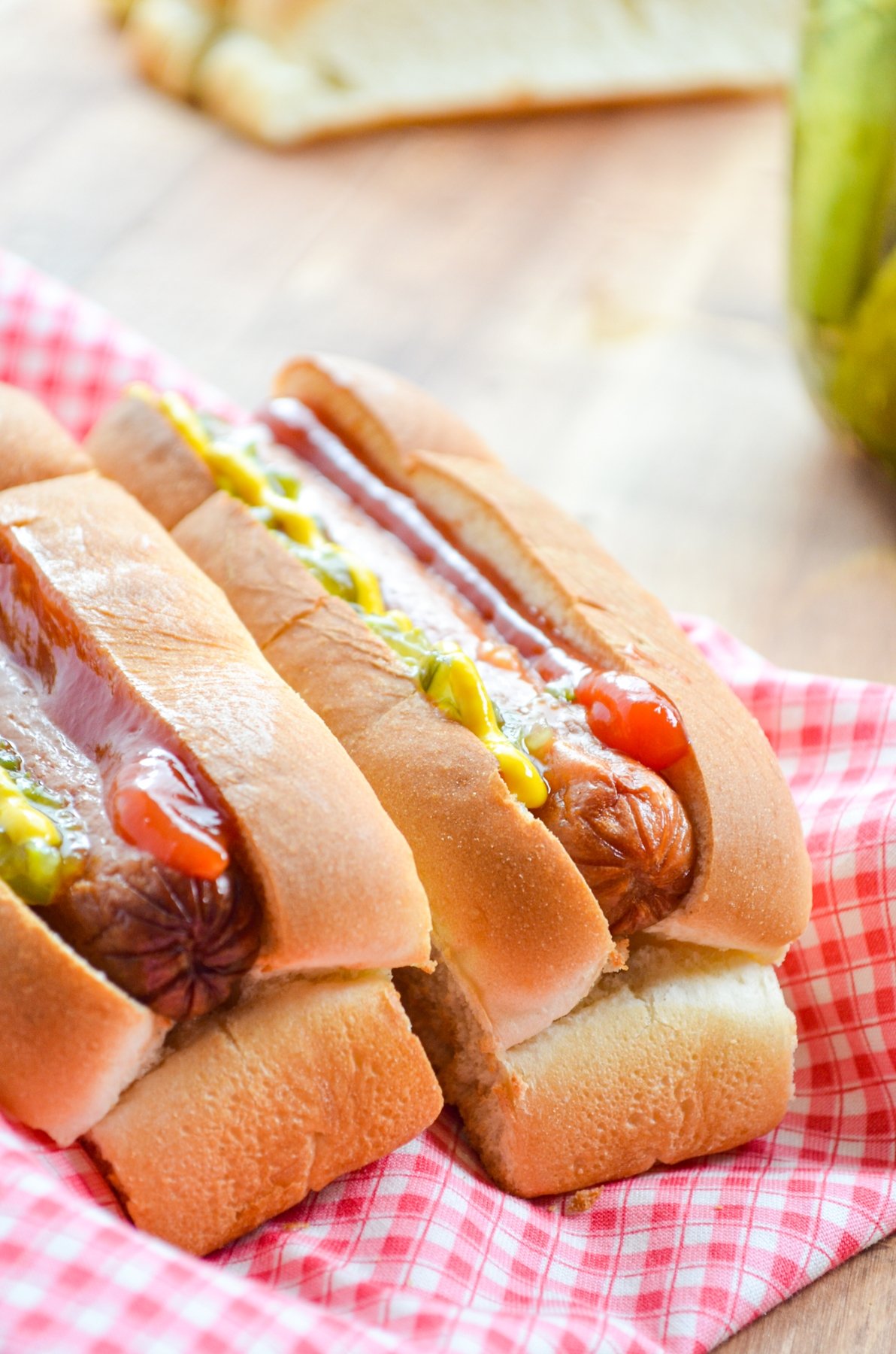 Two hot dogs, served in toasted buns and served with classic toppings.