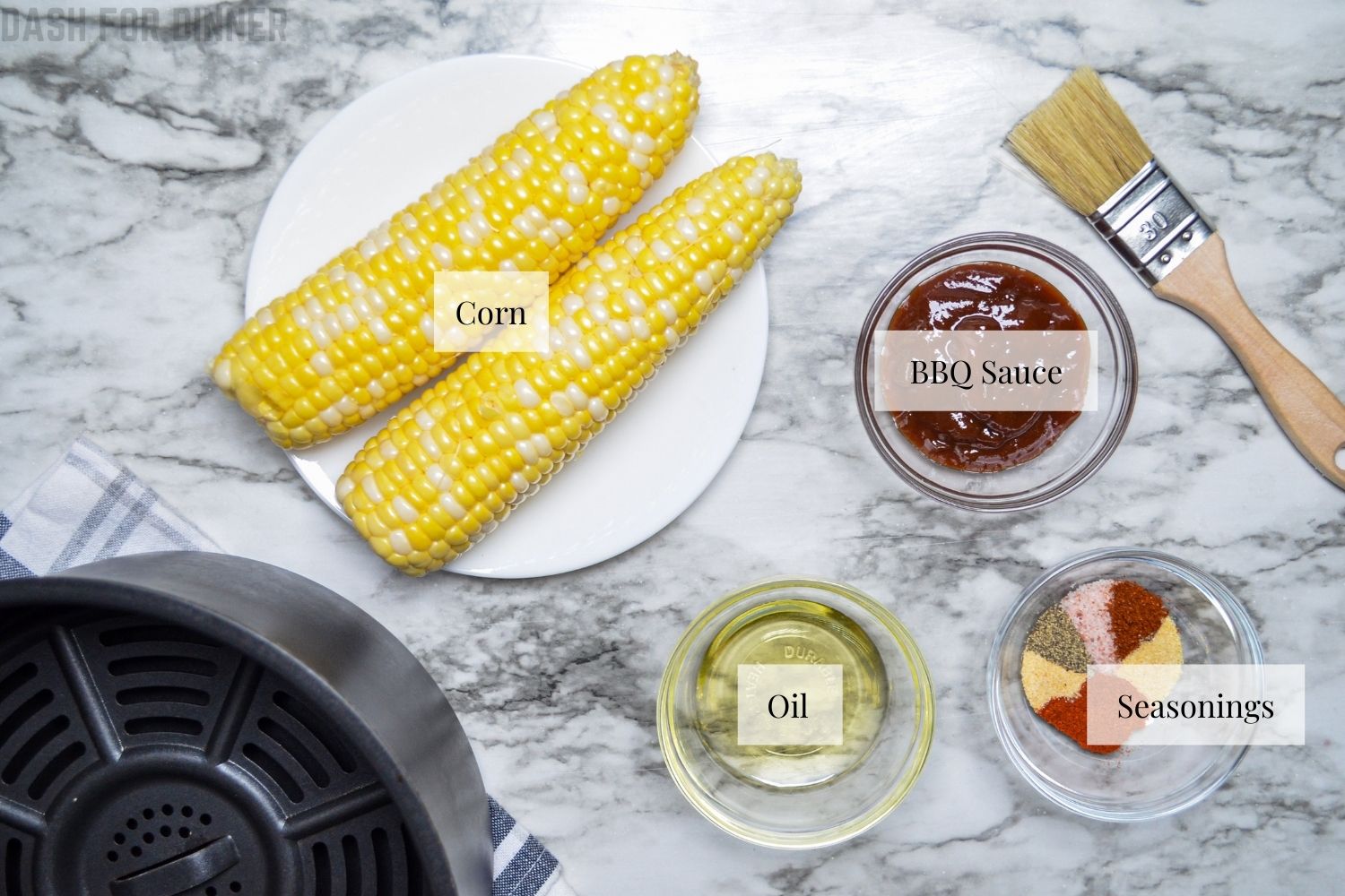 The ingredients needed to make air fryer corn ribs.