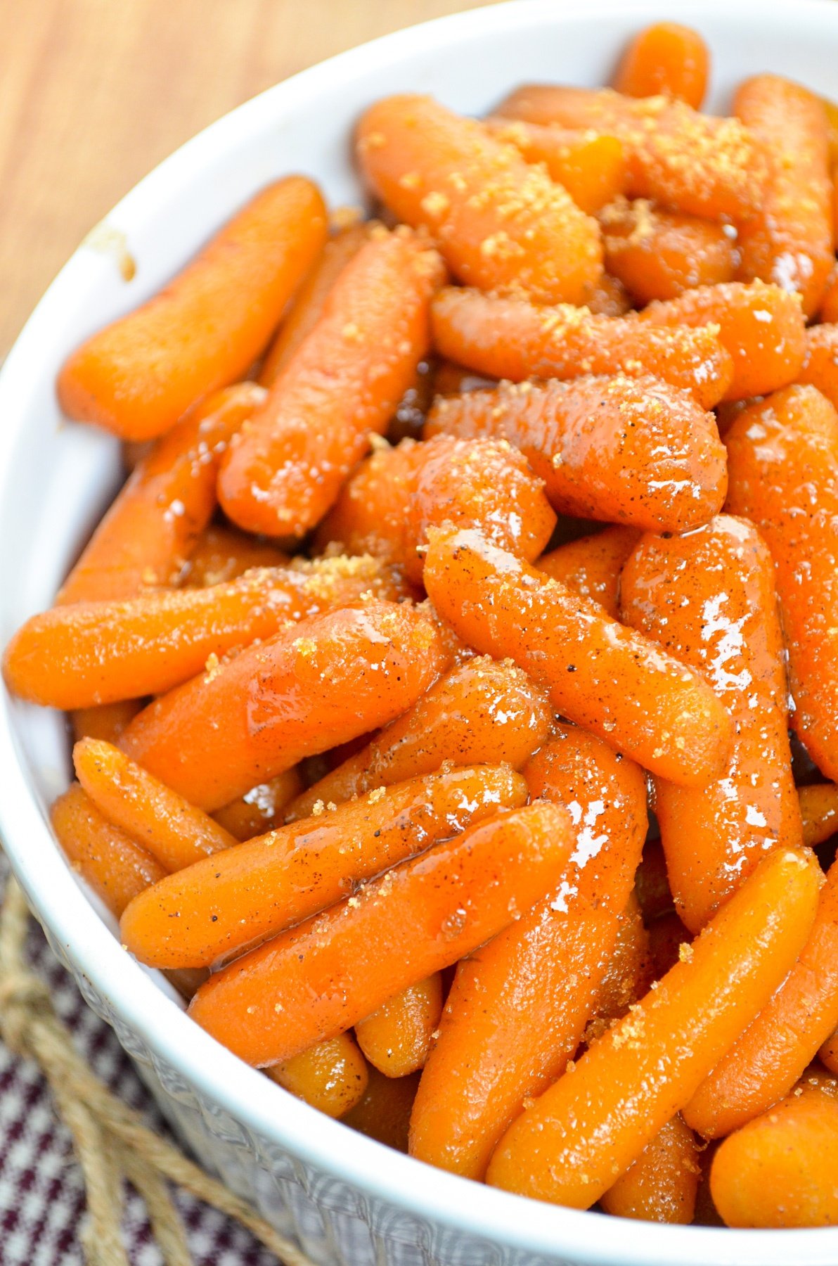A serving dish full of maple glazed carrots.