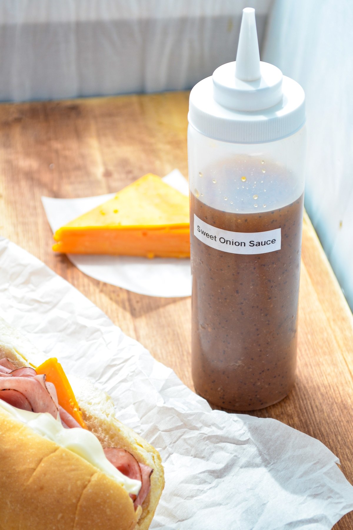 A bottle of homemade sweet onion sauce.