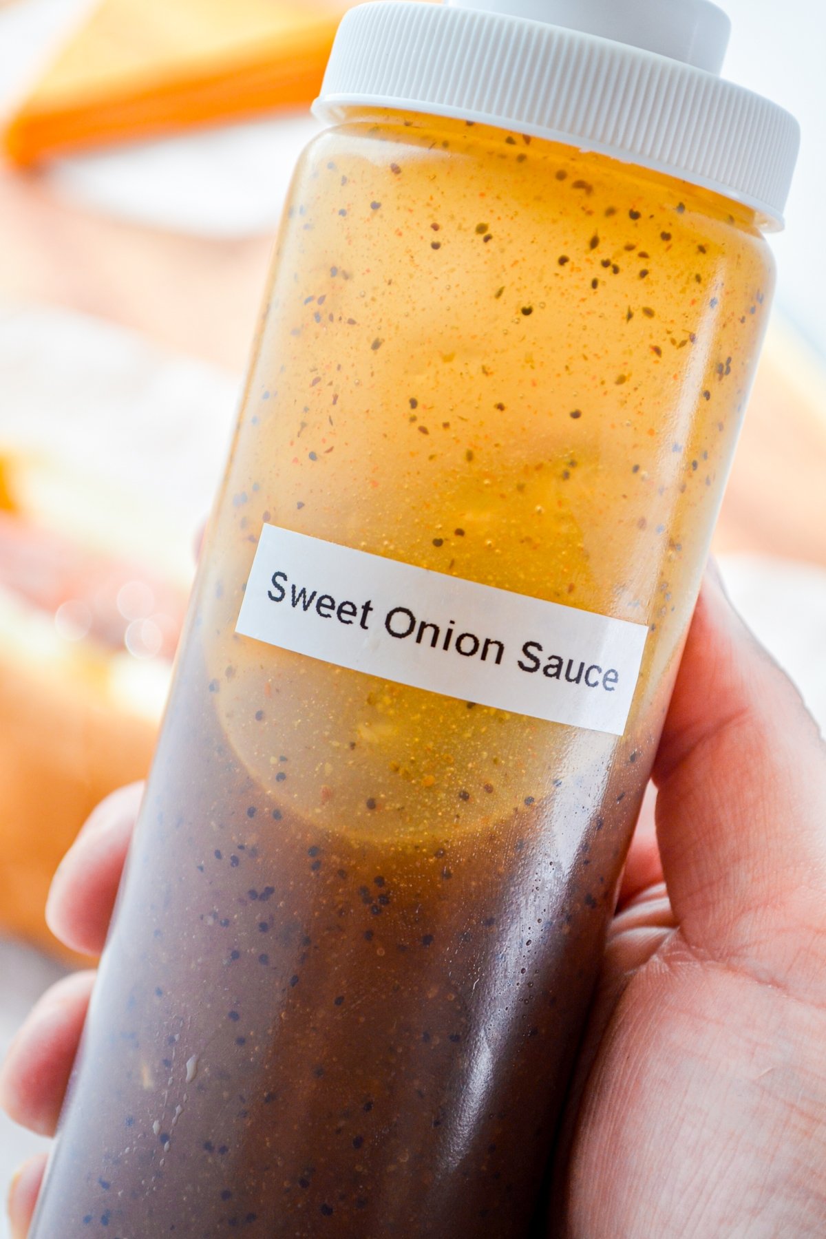 A bottle of homemade Sweet Onion Sauce.