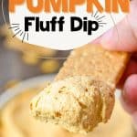 Scooping a portion of pumpkin dip onto a graham cracker.