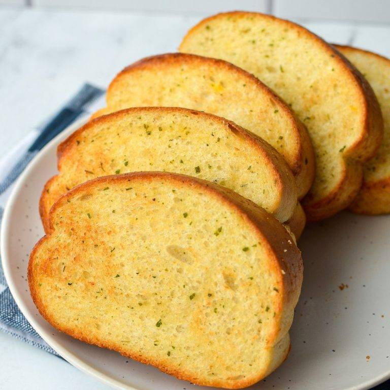 A plate of frozen garlic toast, cooked to perfection.