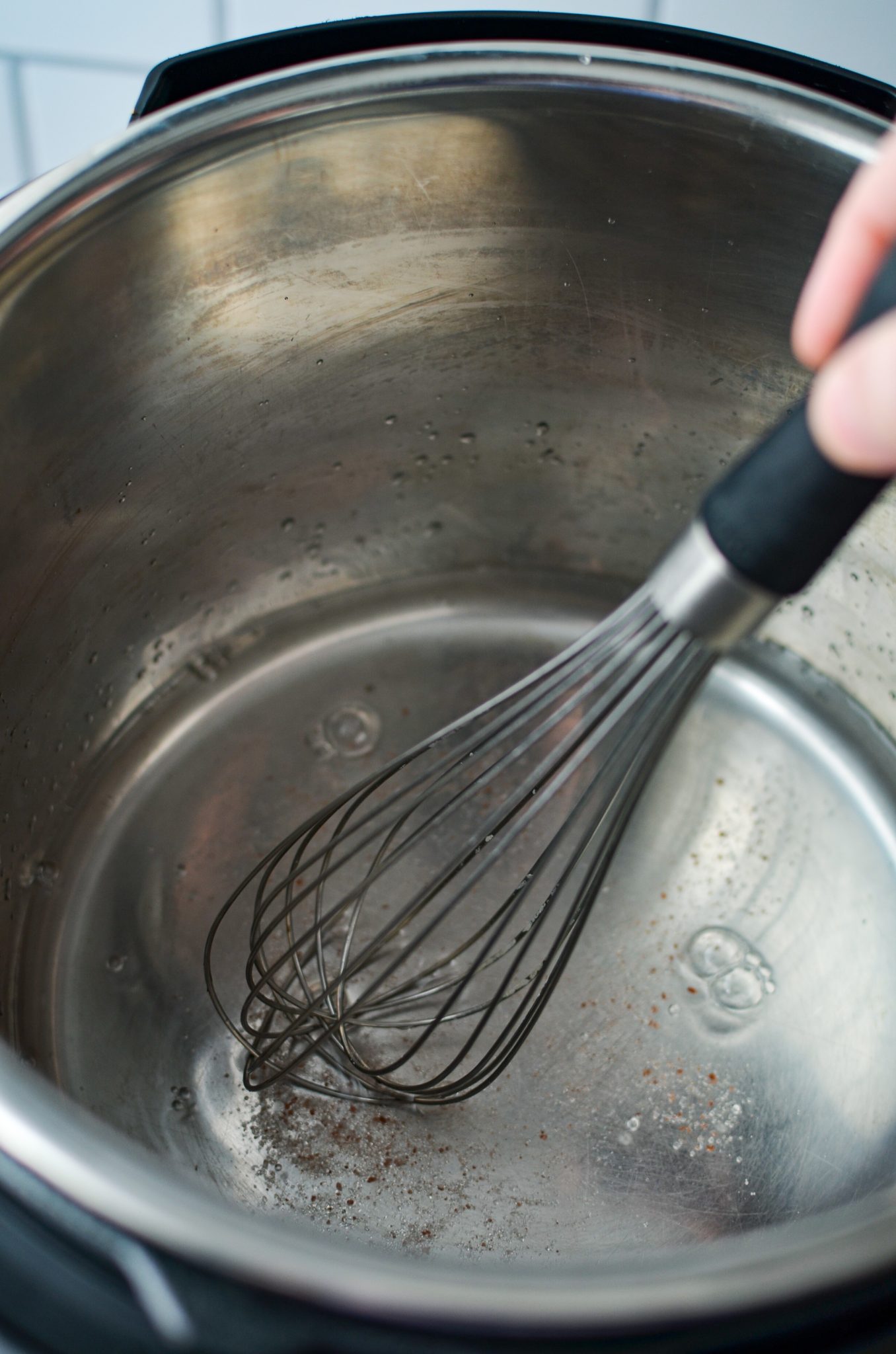 Whisking salt into water in an Instant POt.