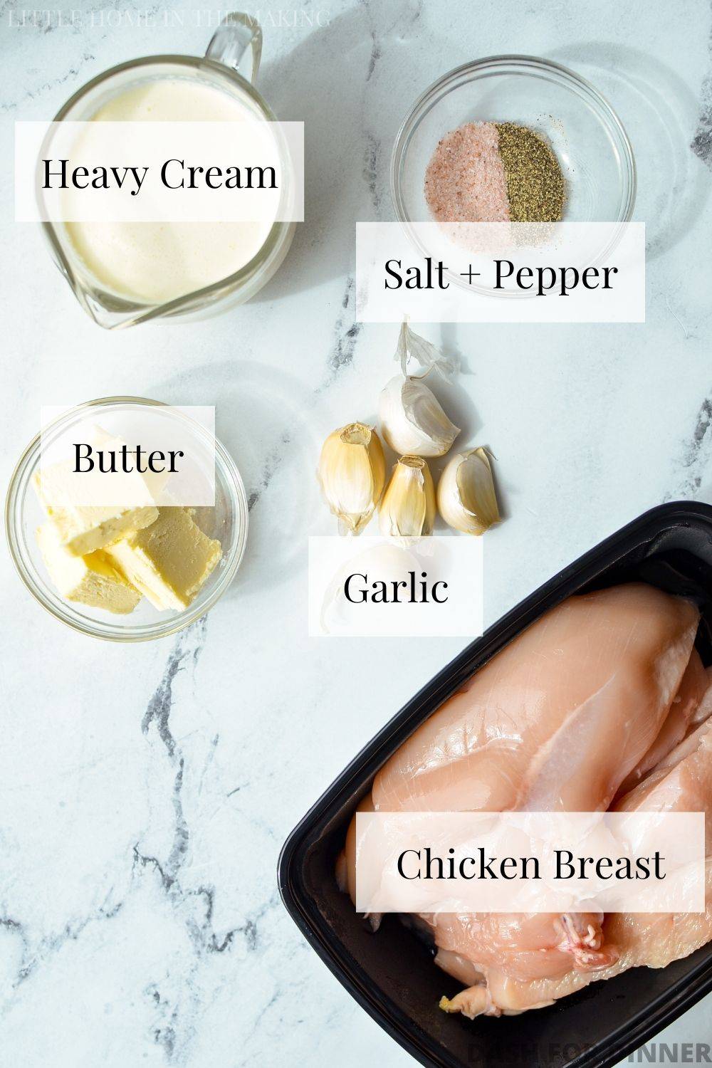 The ingredients needed to make creamy garlic chicken, including heavy cream, butter, and garlic.