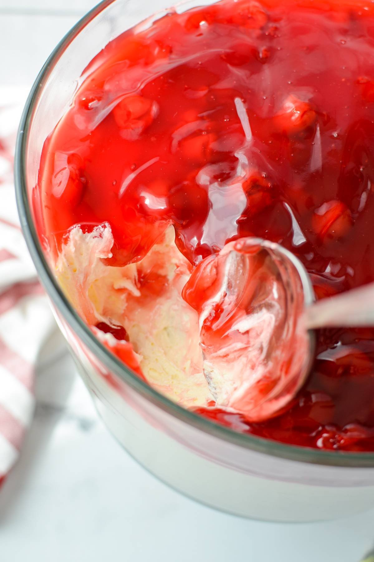 A spoon scooping out some lazy cheesecake salad.