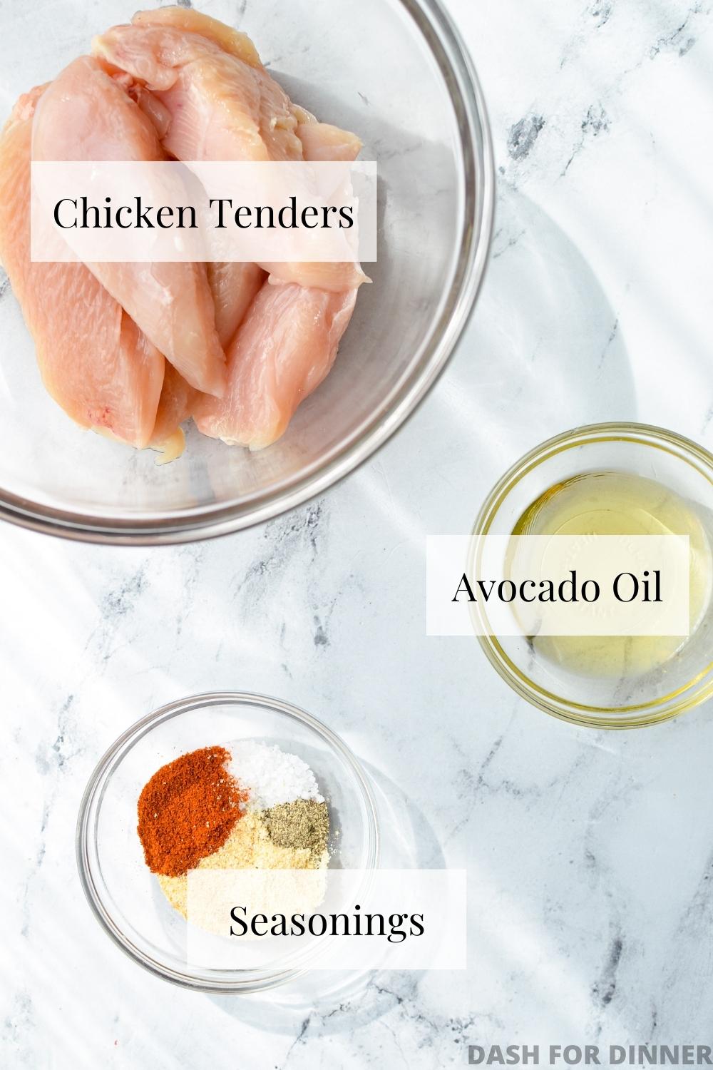 The ingredients needed to make air fryer chicken tenders: tenderloins, oil, and seasoning.
