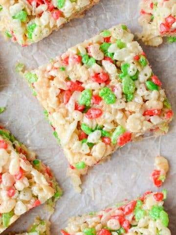 An overheat view of Christmas Rice Krispie treats cut into squares.