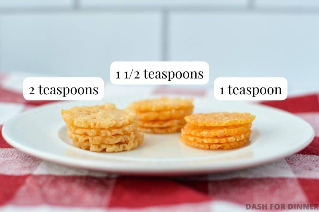 Three stacks of parmesan crisps, showing the difference between 2 teaspoon, 1 1/2 teaspoon, and 1 teaspoon measurements.