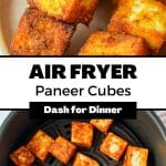 Cubes of seasoned paneer in an air fryer basket.