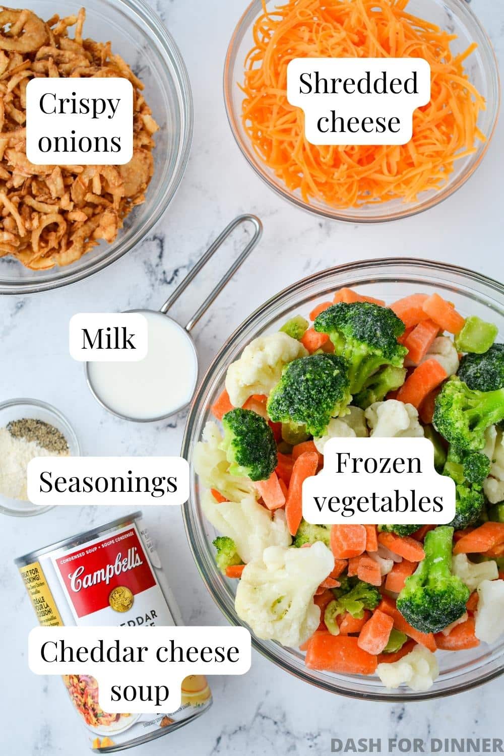 The ingredients needed to make vegetable casserole: veggies, cheese, condensed soup, etc. 