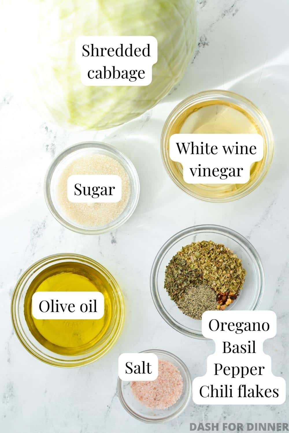 The ingredients needed to make a swedish pizza salad: vinegar, oil, seasons, salt, and sugar.