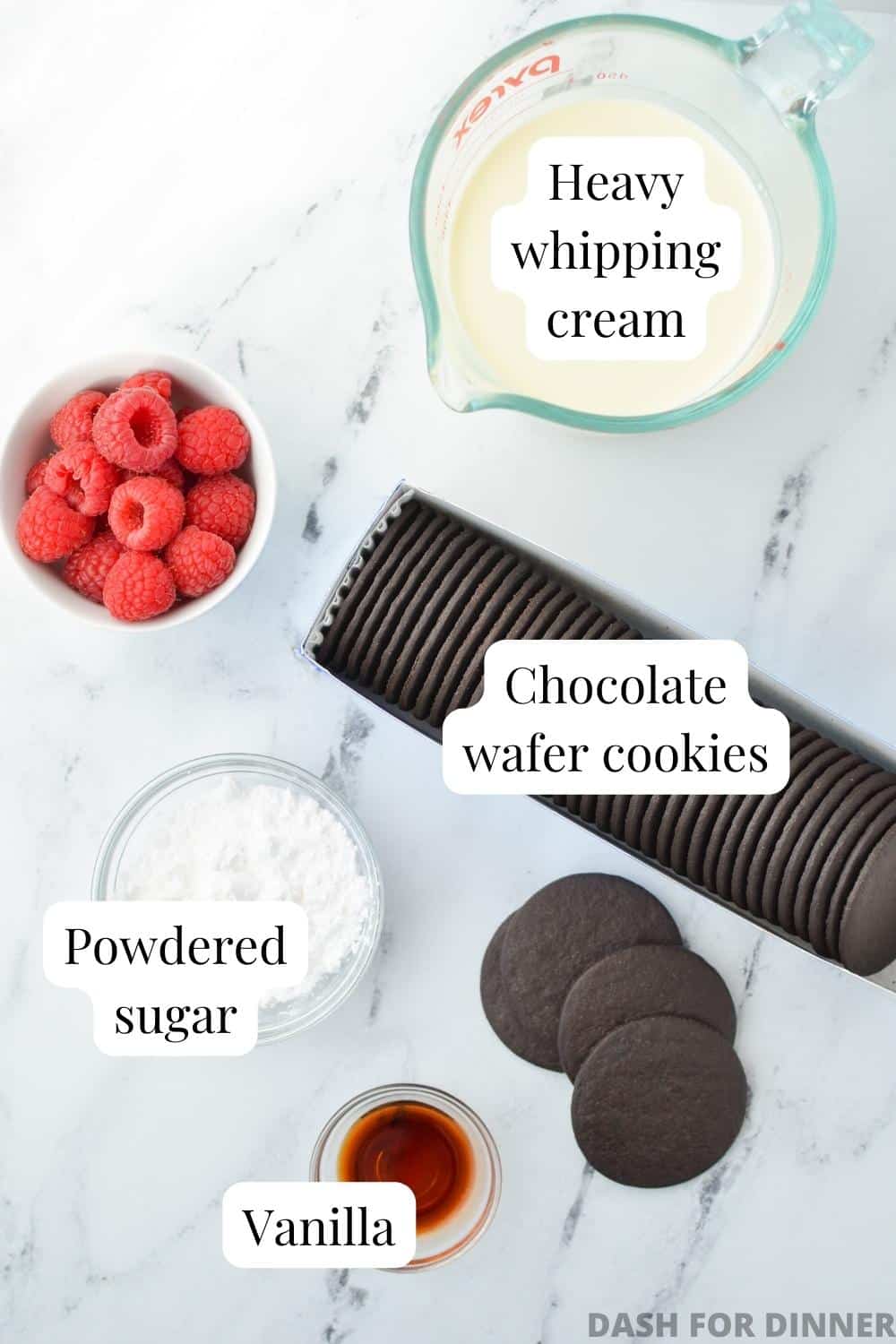 The ingredients needed to make icebox cake: chocolate wafers, heavy cream, vanilla, and powdered sugar.