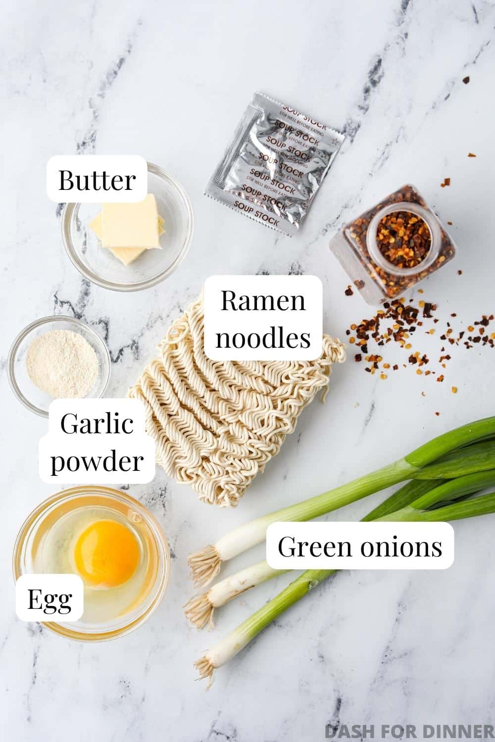 The ingredients needed to make Kylie's ramen: egg, butter, garlic powder, and ramen noodles.