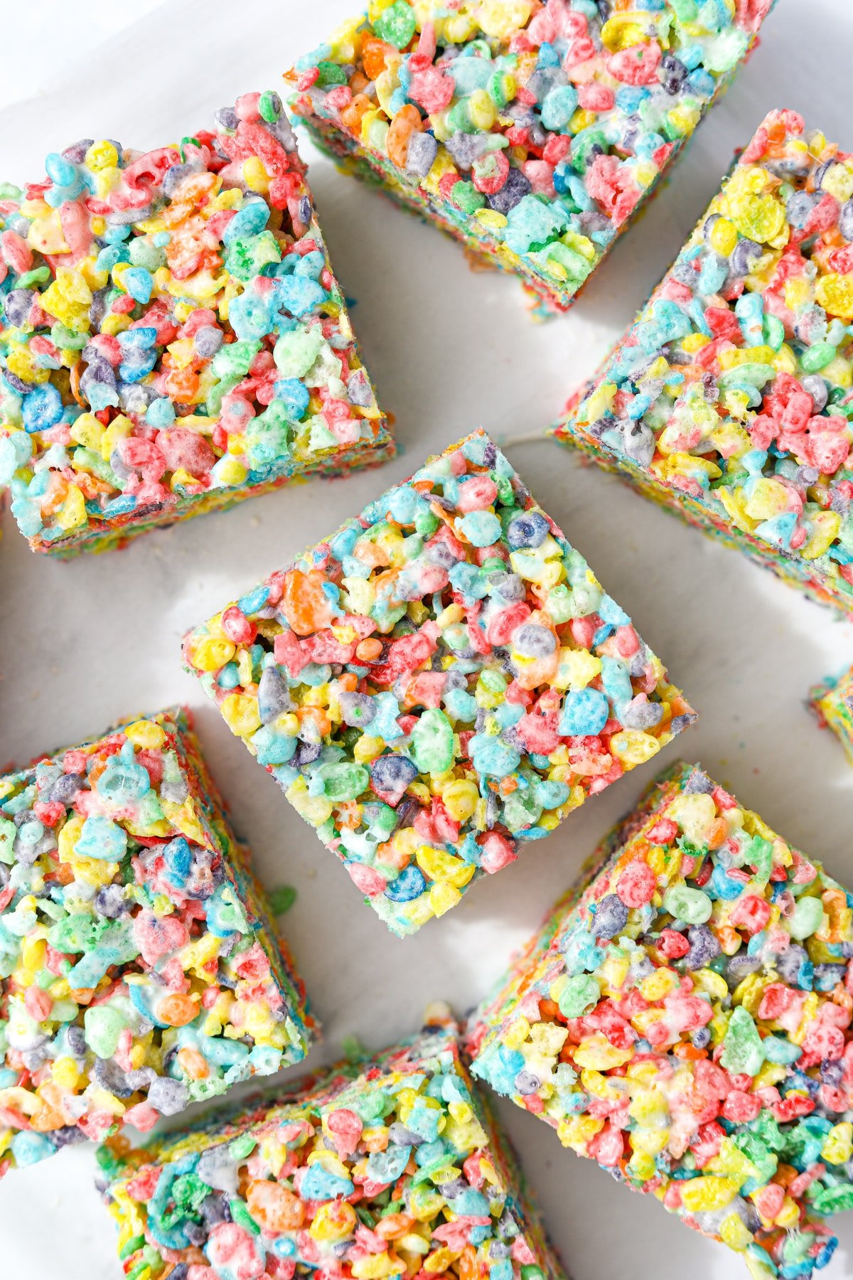 Fruity pebbles treats on a white background.