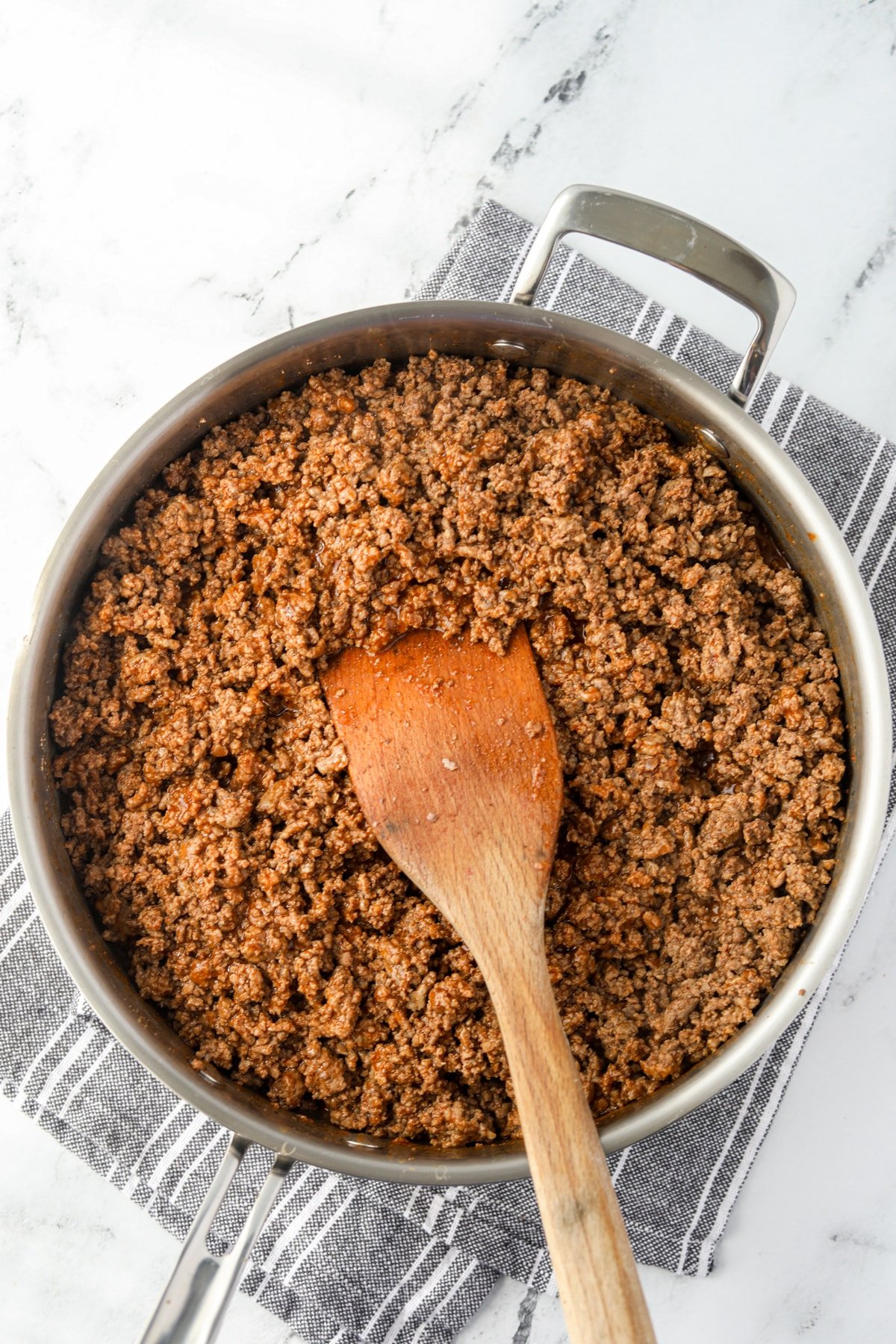A skillet filled with ground beef taco meat.