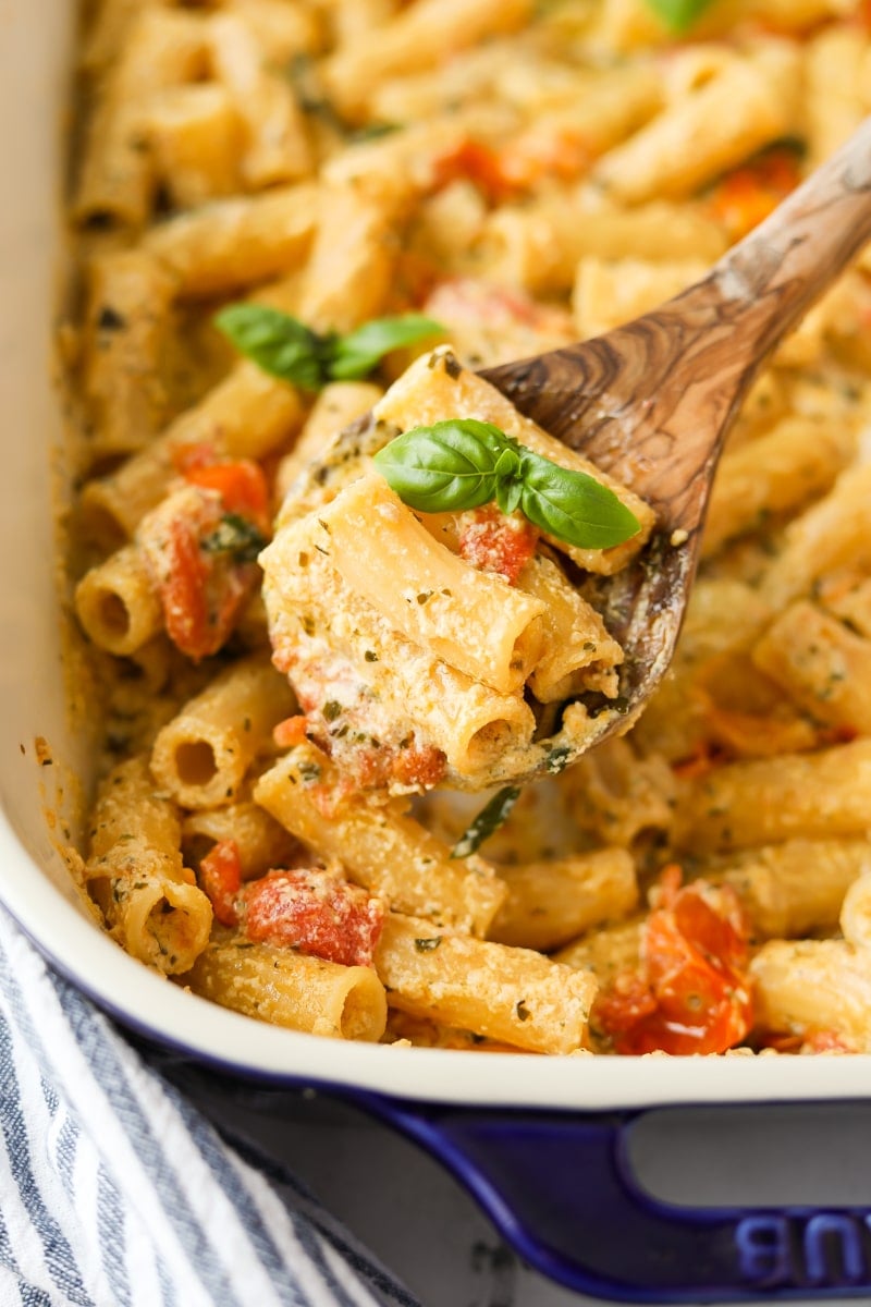 A spoon taking a portion of creamy Boursin pasta.