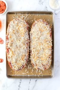 French bread topped with shredded cheese.