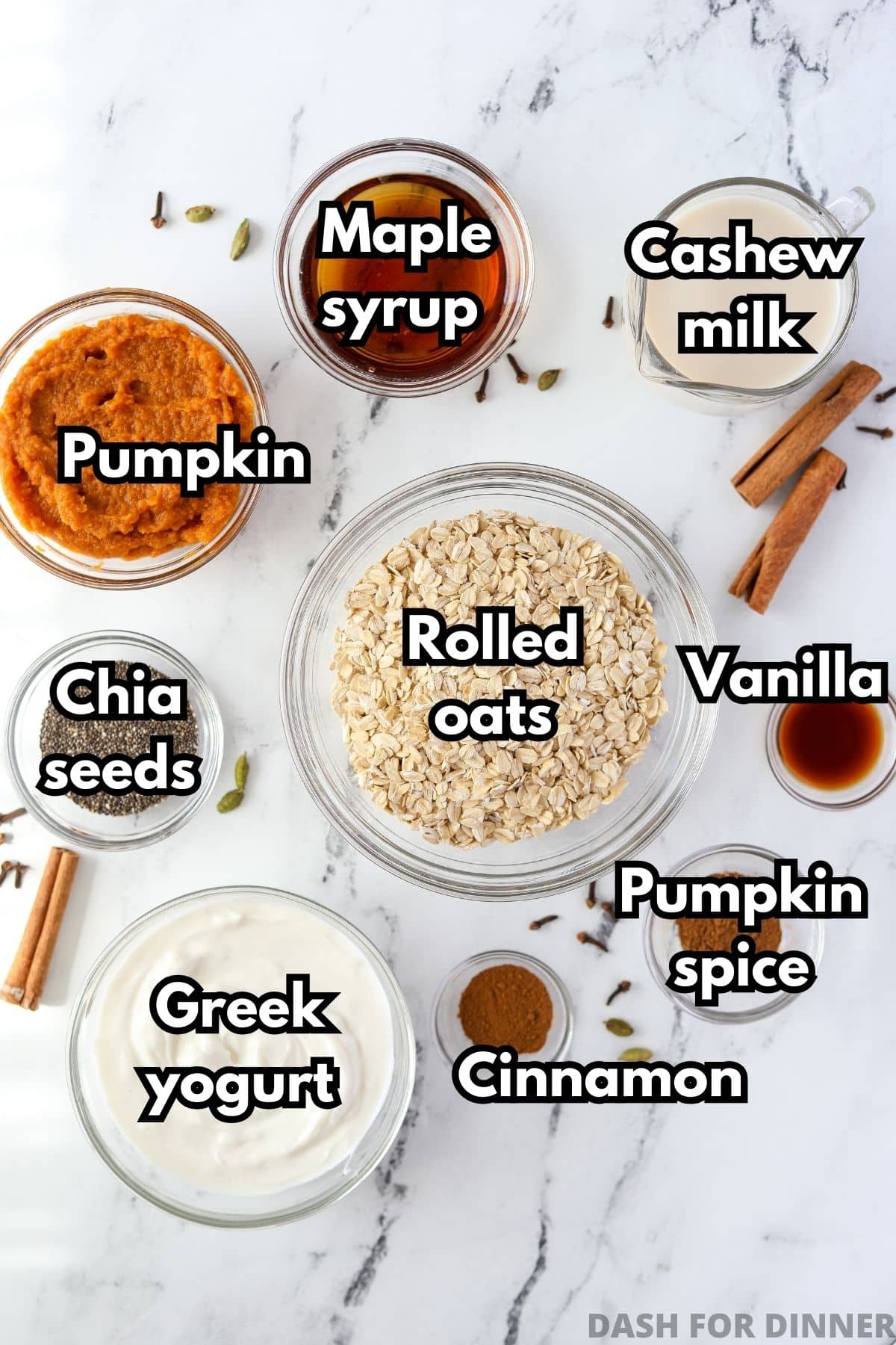 The ingredients needed to make overnight oats: rolled oats, yogurt, chia, pumpkin, maple syrup, etc.