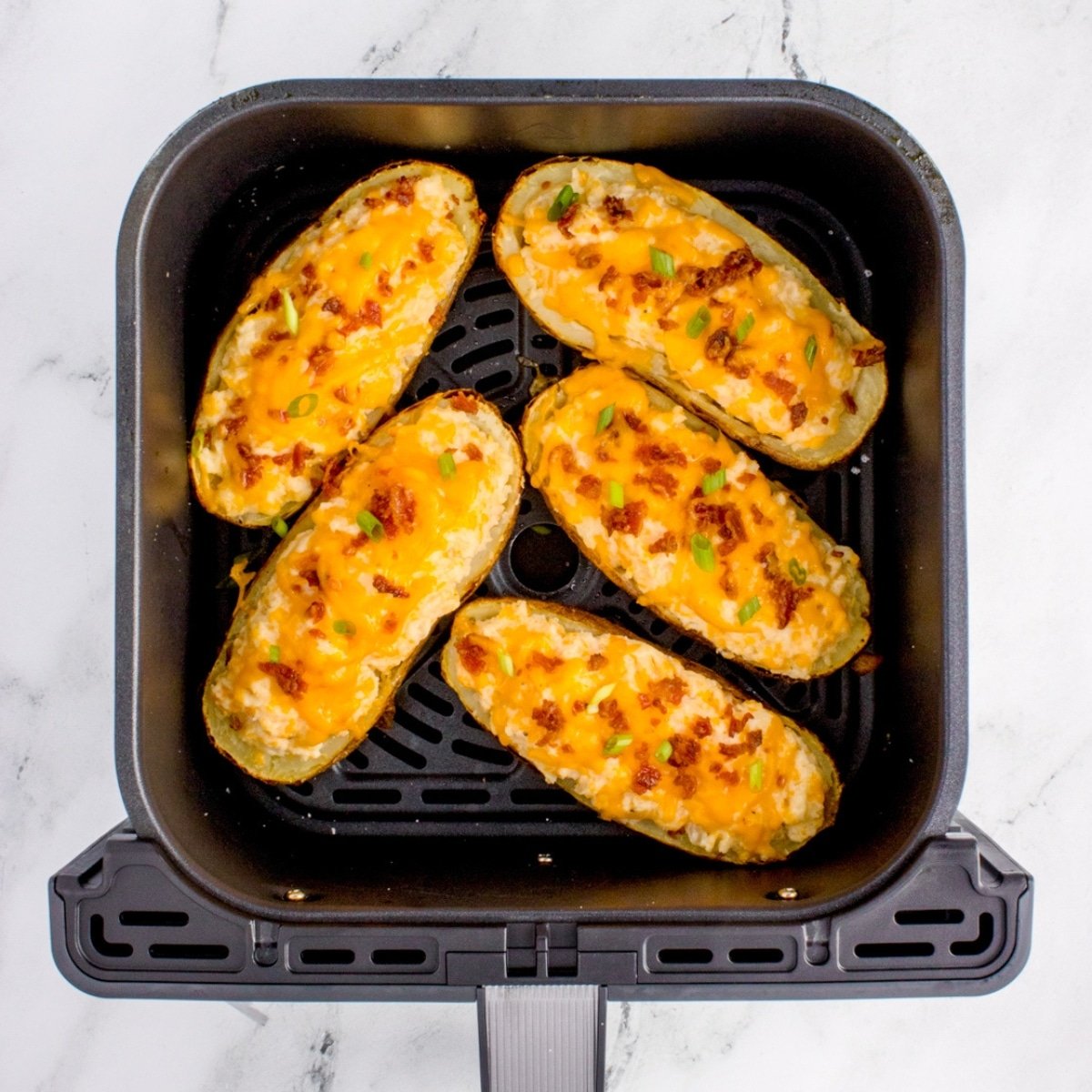 Air Fryer Twice Baked Potatoes - Dash for Dinner