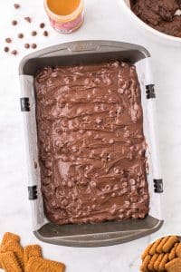 A baking pan filled with brownie batter.