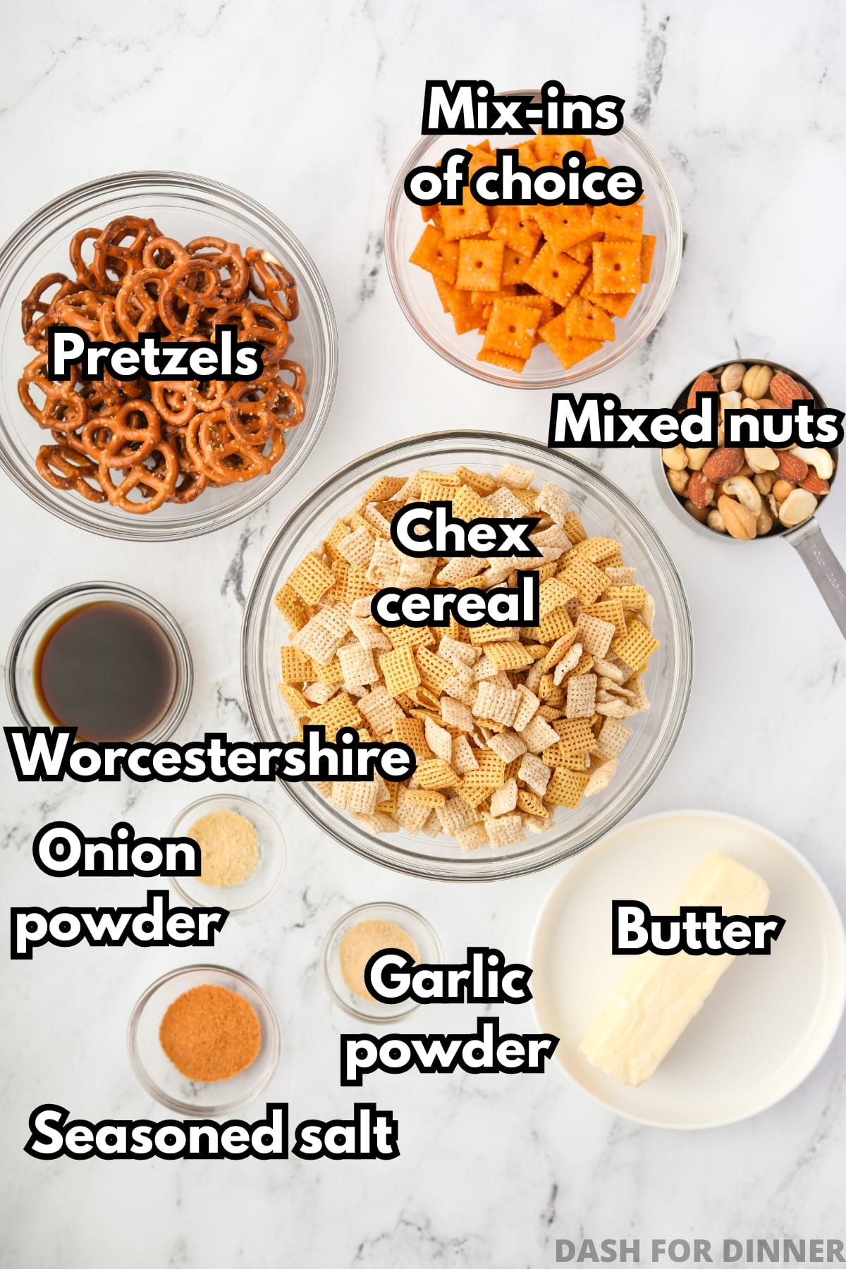 The ingredients needed to make chex mix: cheese crackers, cereal, nuts, butter, worcestershire sauce, seasonings, etc.