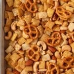 A sheet pan spread with a homemade snack mix.