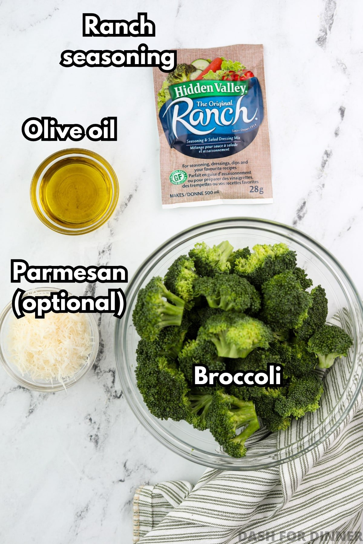 The ingredients needed to make ranch broccoli: broccoli, olive oil, ranch seasoning, and parmesan cheese.