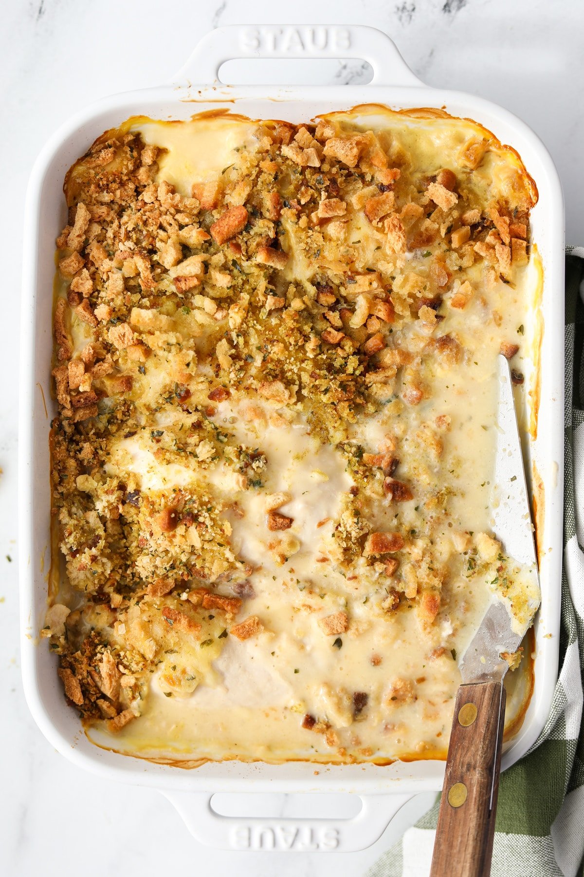 A baking dish filled with chicken and stuffing casserole.