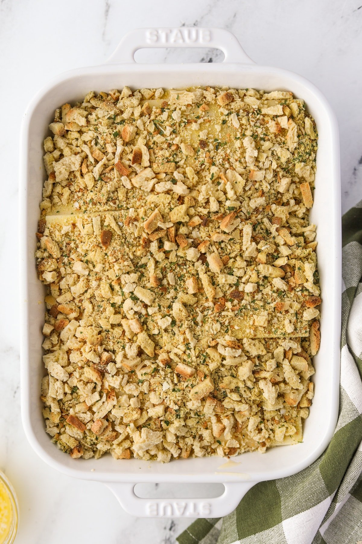 A baking dish casserole topped with stuffing mix.