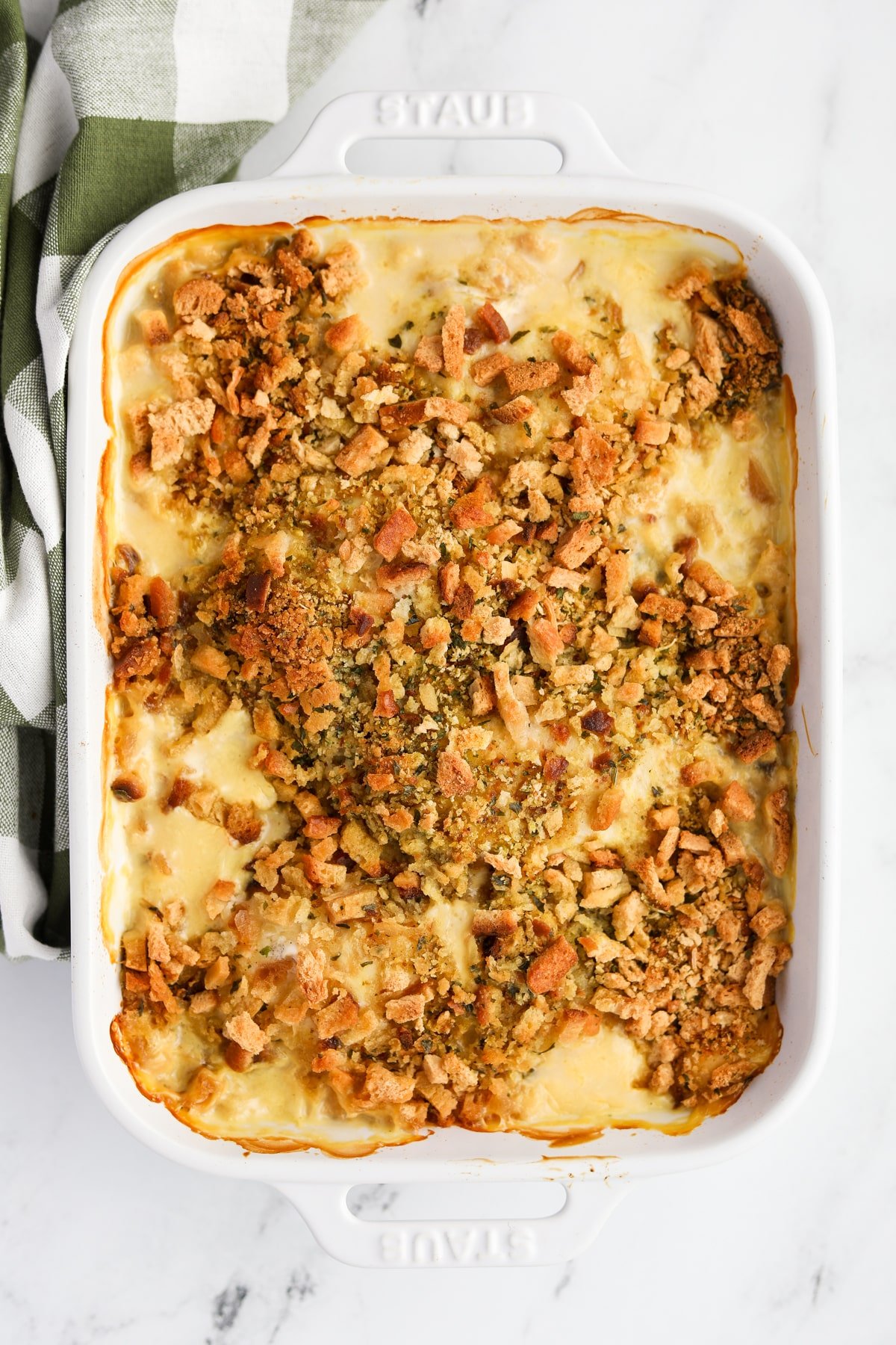 A baking dish filled with chicken and stuffing casserole.