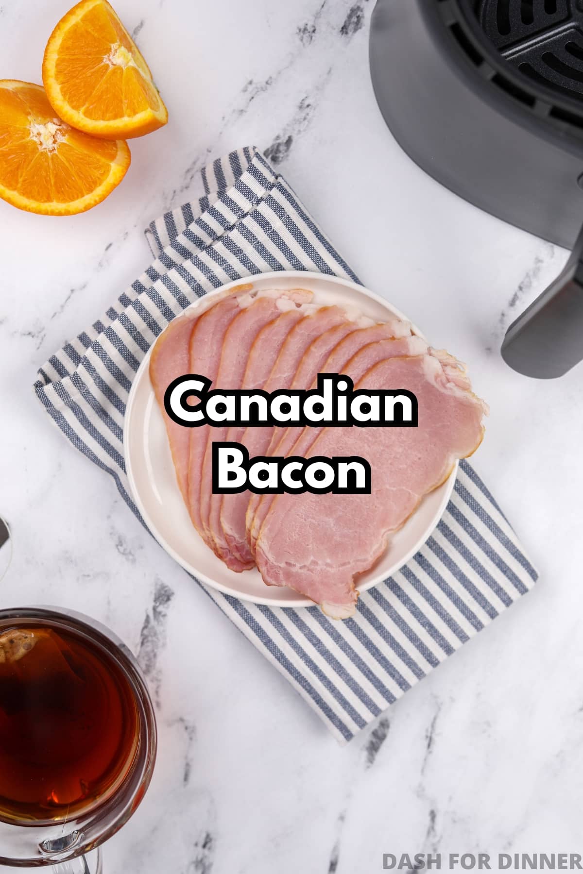 A plate with several slices of uncooked Canadian bacon.