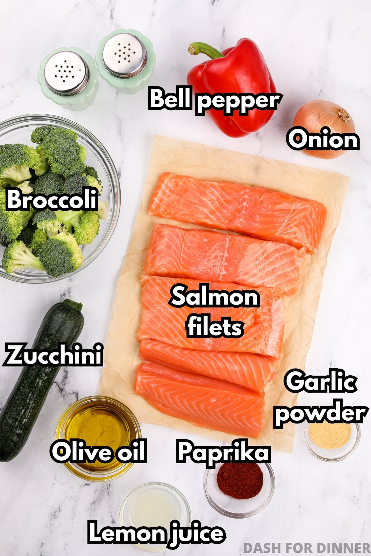The ingredients needed to make sheet pan salmon with vegetables: salmon fillets, olive oil, broccoli, bell pepper, etc.