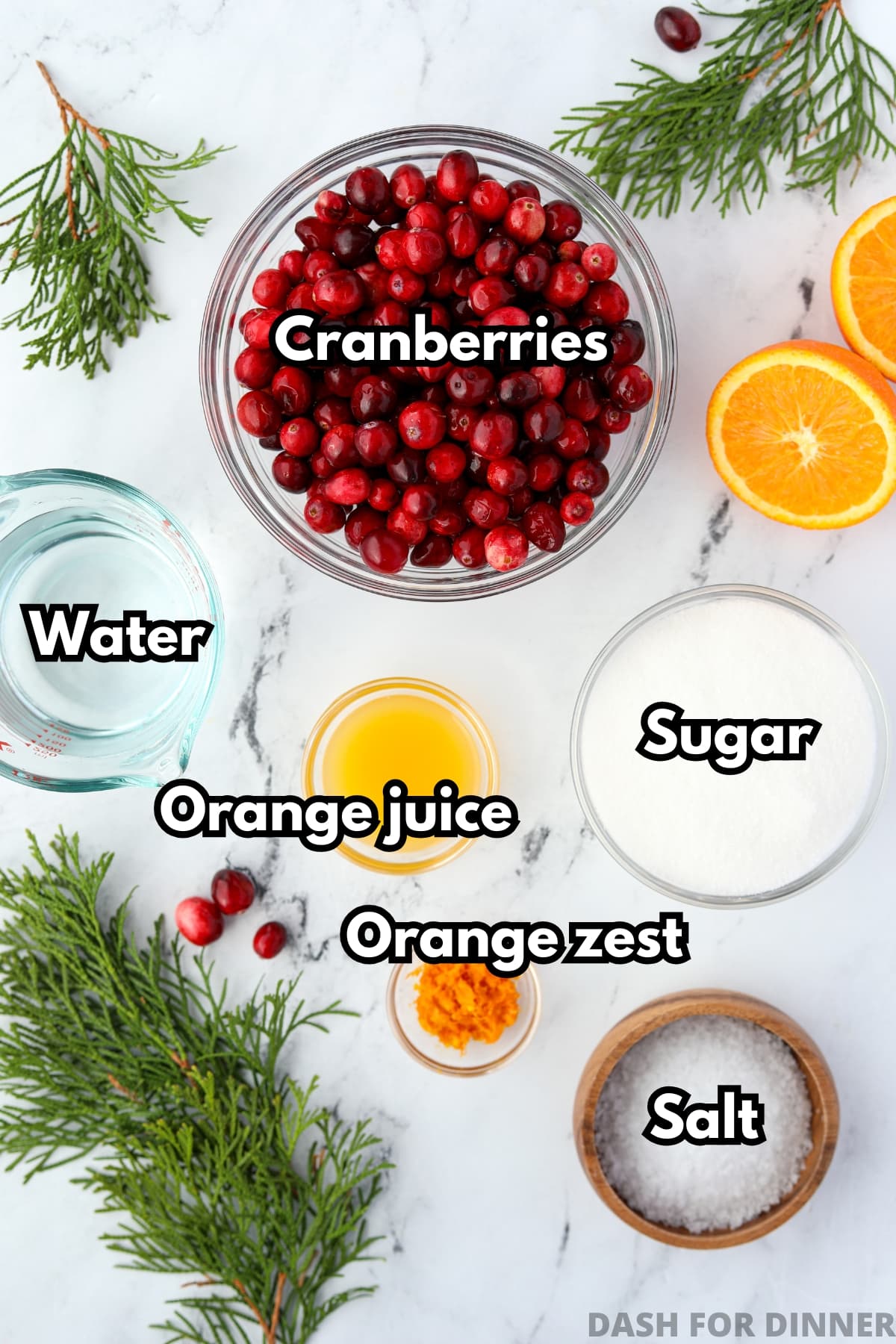 The ingredients needed to make cranberry sauce: whole cranberries, sugar, orange zest, orange juice, water, and salt.