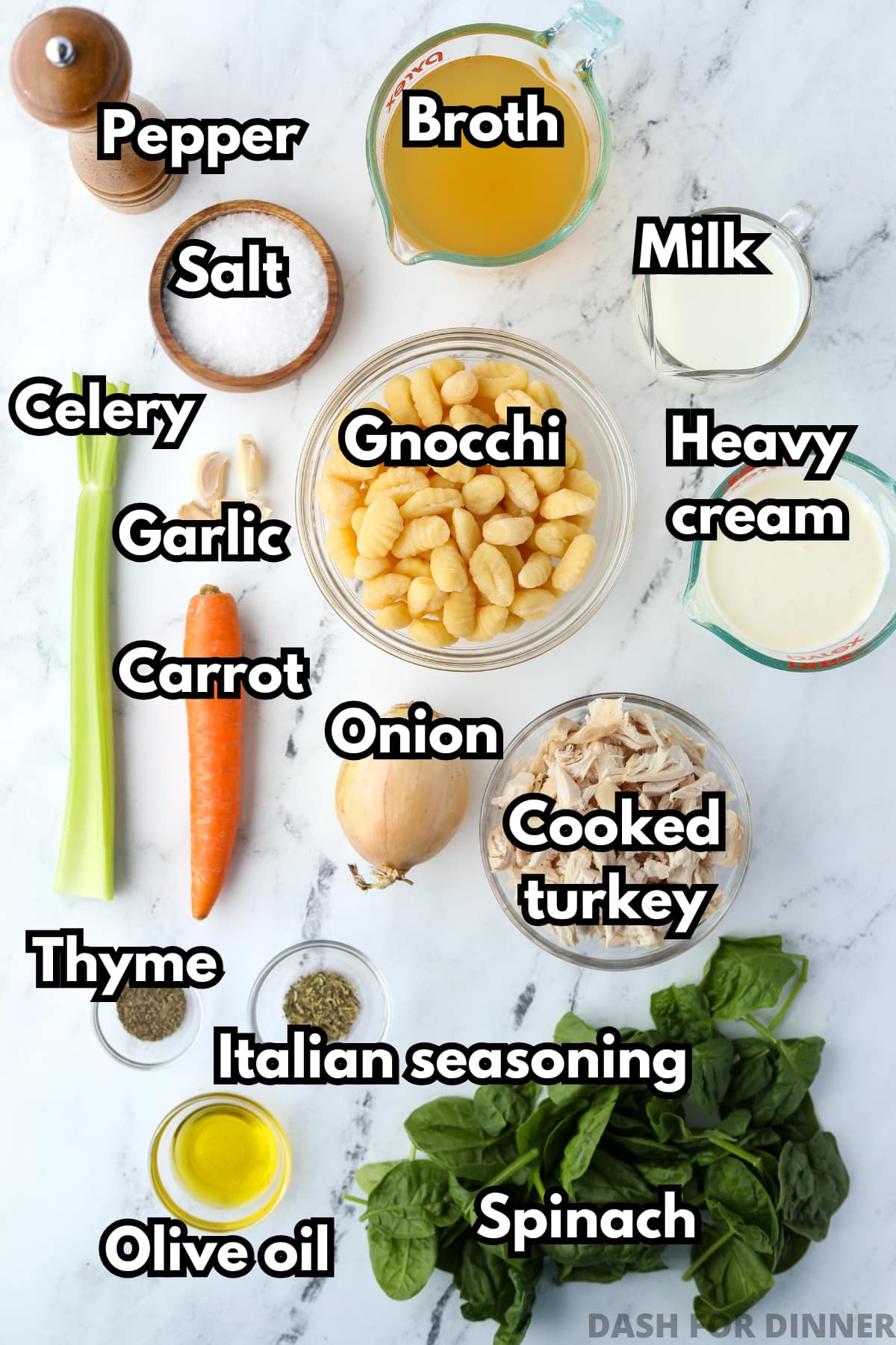 The ingredients needed to make turkey soup with gnocchi, including cooked turkey, aromatic vegetables, broth, and cream.