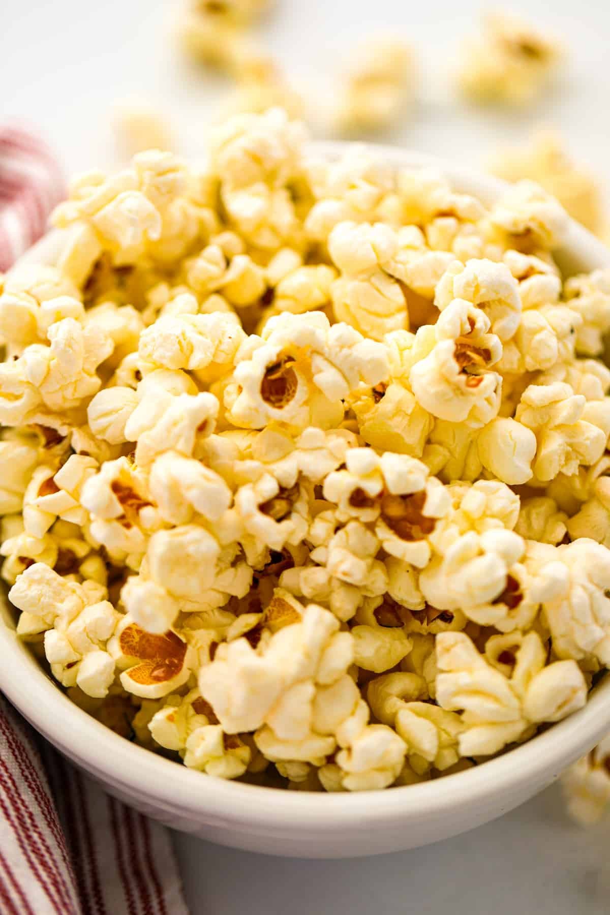 A close up on a bowl of homemade popcorn.