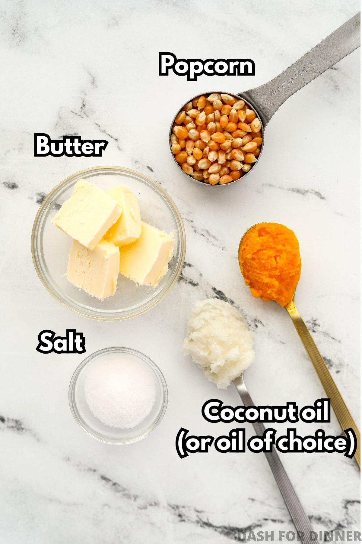 The ingredients needed to make stovetop popcorn: kernels, coconut oil (or popcorn oil), butter, and salt.