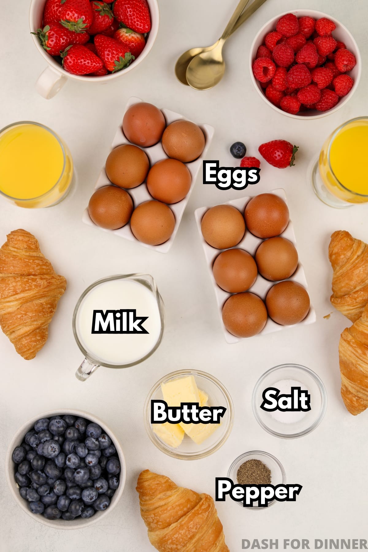 The ingredients needed to make baked scrambled eggs: milk, butter, salt, pepper, and eggs.