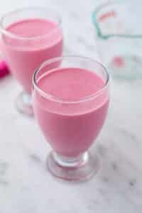 Parfait glasses filled with greek yogurt jello mousse.