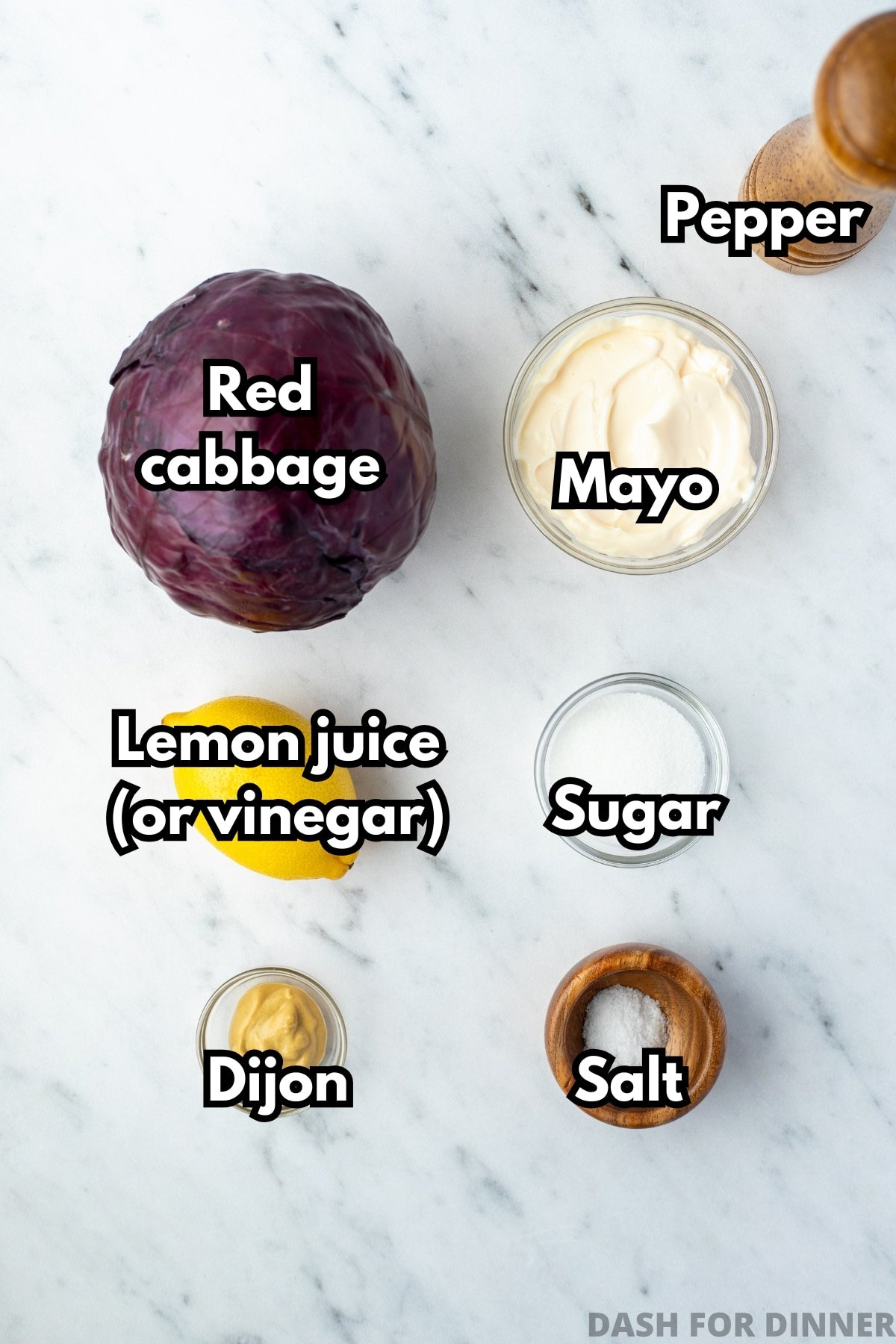 A head of red cabbage, mayonnaise, lemon, sugar, dijon mustard, and salt.
