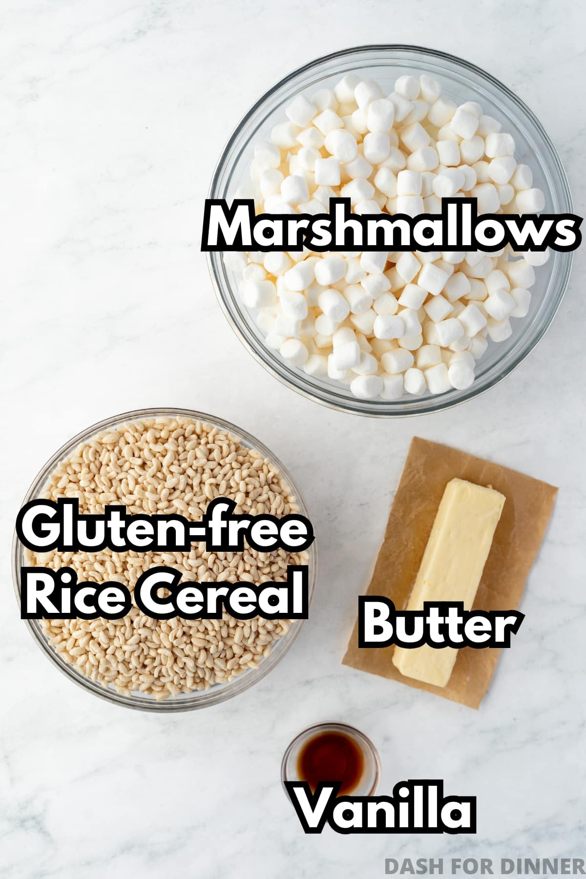 The ingredients needed to make gluten free rice crispy treats, including marshmallows, rice cereal, butter, and vanilla.
