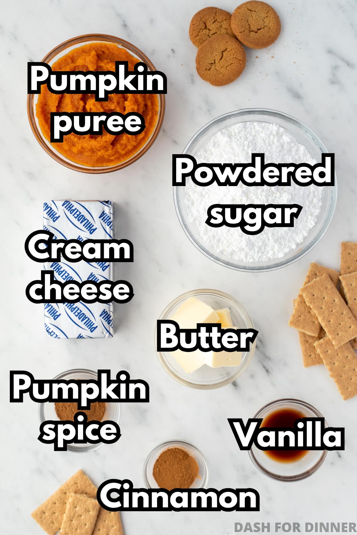 The ingredients needed to make pumpkin dip, including cream cheese, pumpkin, powdered sugar, etc.