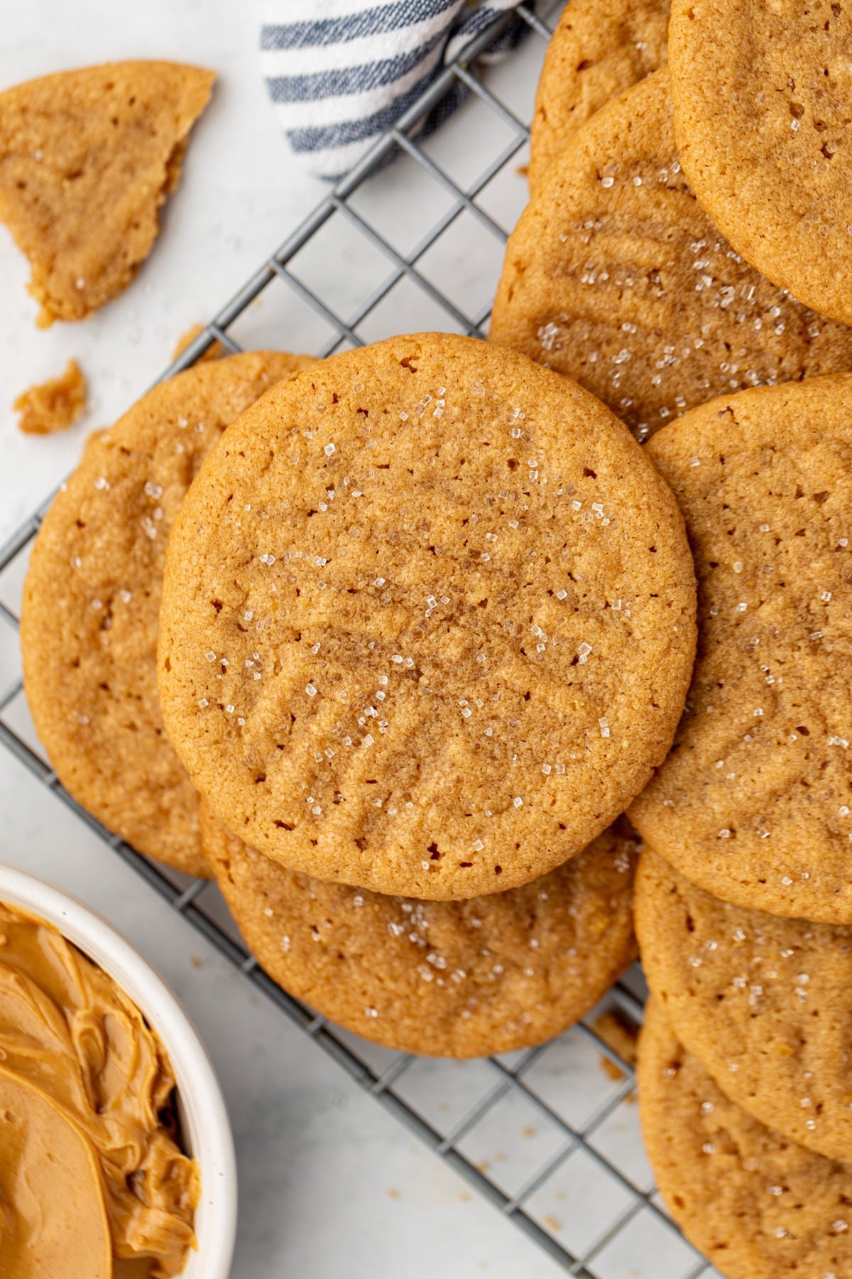 Peanut butter cookies on a wire rack.