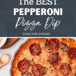 A round baking dish filled with creamy pizza dip, topped with crispy pepperoni slices.