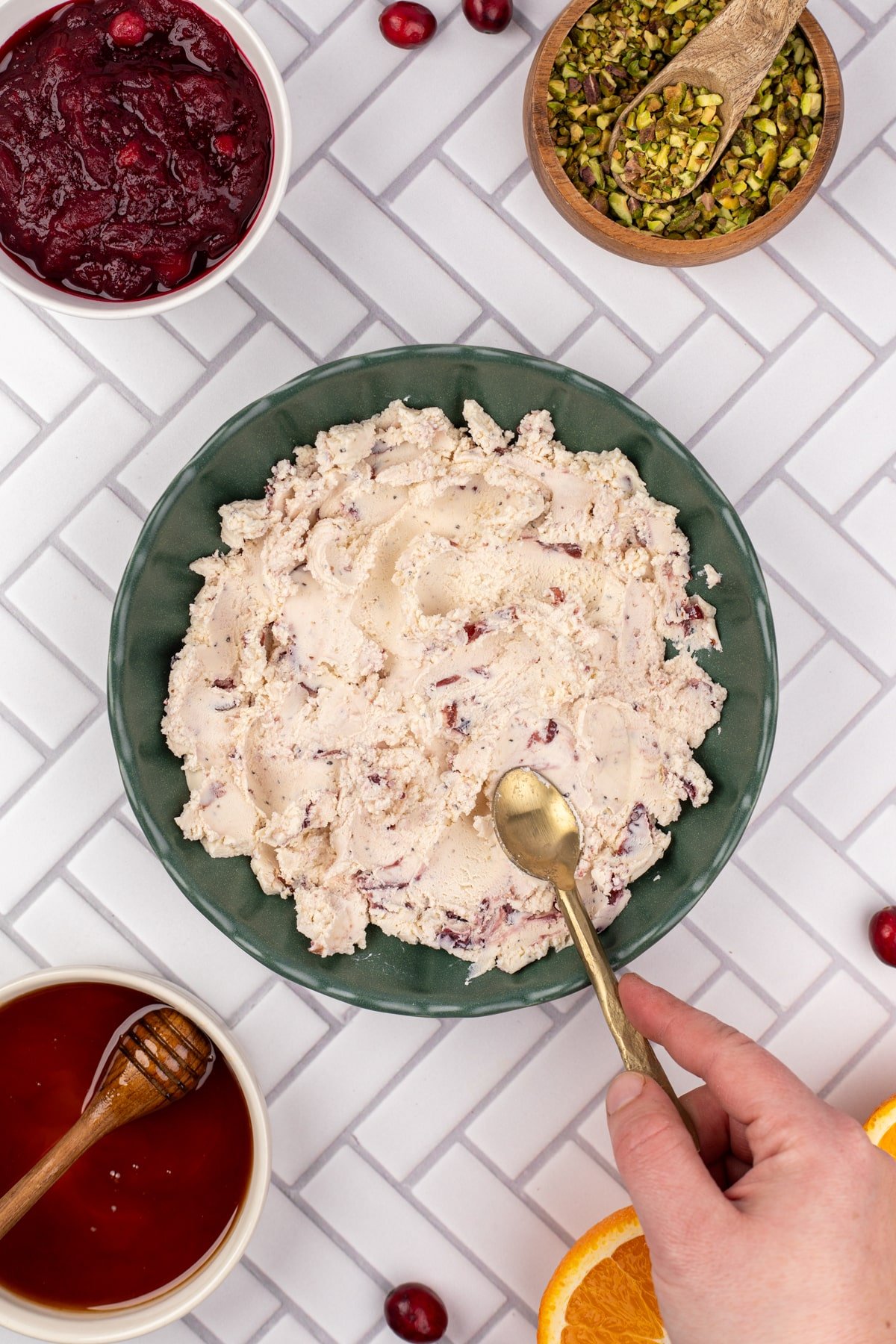 Pressing boursin gournay cheese into a serving bowl.