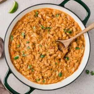 A skillet filled with taco macaroni and cheese.